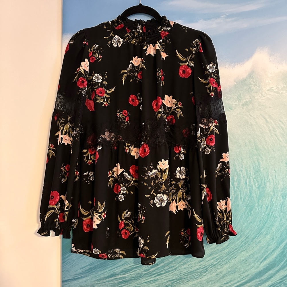 Black floral blouse